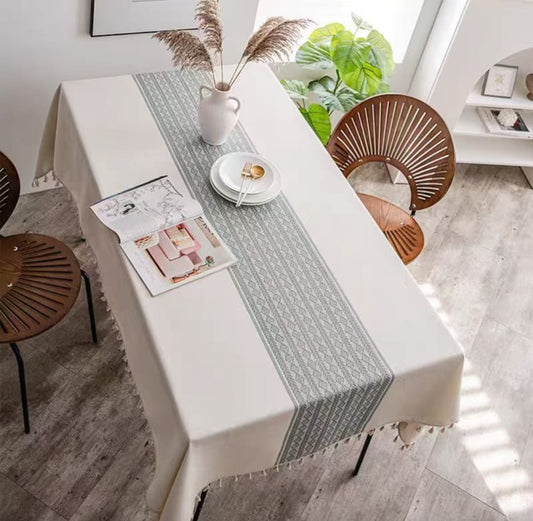 Dining table cloth measuring 140cm by 220cm.