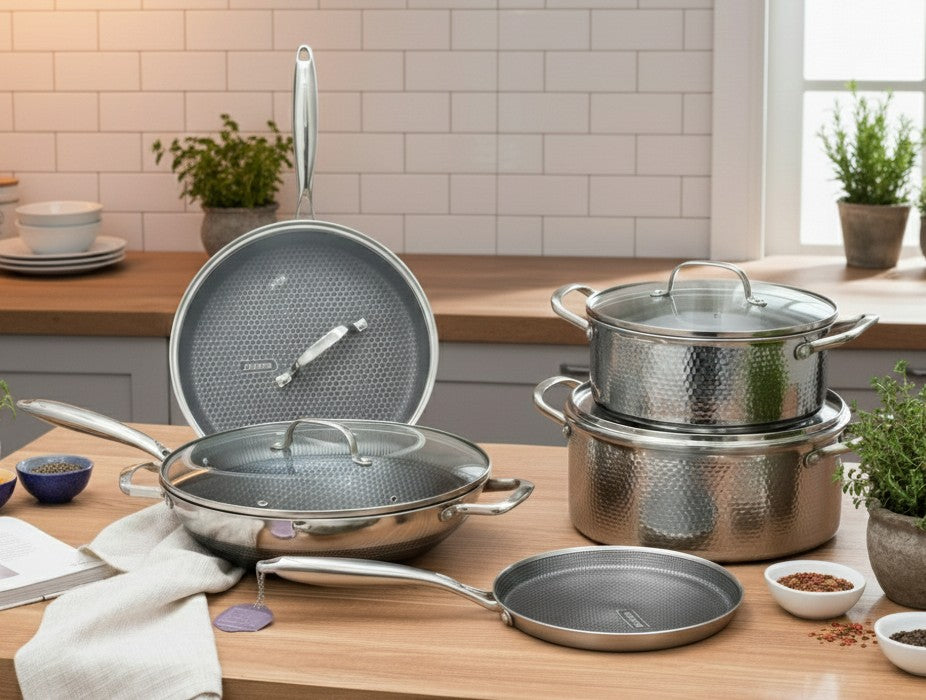 9-piece triple stainless steel cookware set with hammered design including casserole, wok, fry pan, and chapati pan
