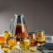 7 piece smoky grey glass beverage set with a 1750 ml jug and six 350 ml matching drinking glasses