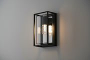 Black outdoor wall light with box frame design, clear glass panels, and E27 holder, IP65 weatherproof fixture
