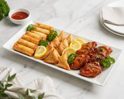 White ceramic rectangular shallow serving platter 14 x 6.5 inch serving tray for appetisers desserts snacks buffet presentation weddings hotels and dining events.