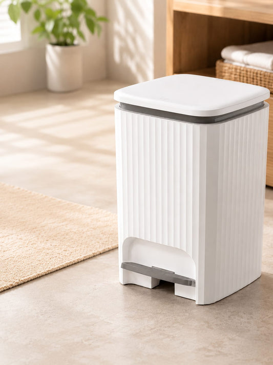 Foot pedal plastic dustbin with elegant finish for bathroom, kitchen, and home waste disposal.