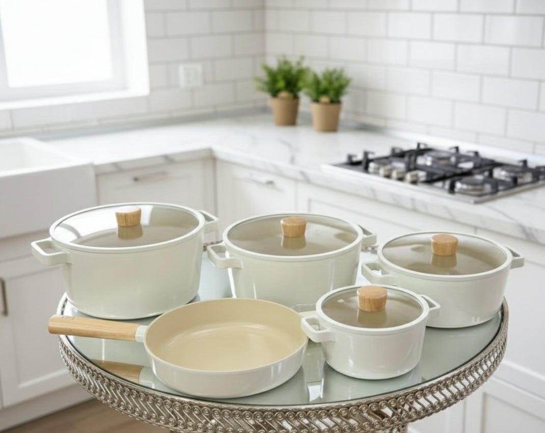 Ceramic cookware set with pots, frying pan, and silicone holders
