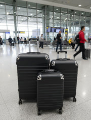 Fiber suitcase available in large, medium, and small sizes.