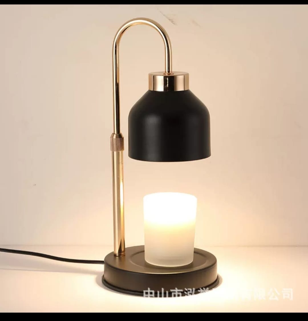 Electric candle warmer lamp in black and white metal design for home use