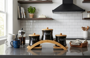 3 Piece piece white kitchen canister set with a decorative golden rack for stylish countertop storage