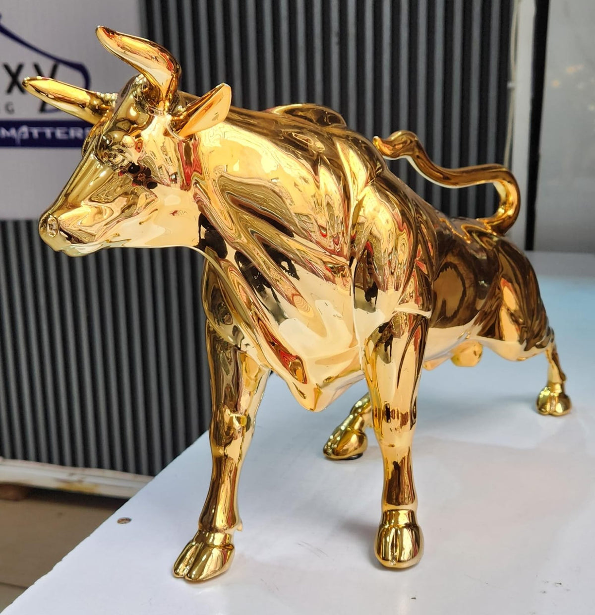 Golden Charging Bull Sculpture