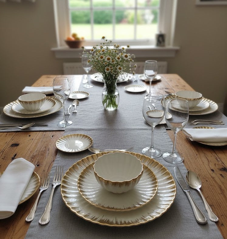 White ceramic shell dinner set with gold detailing