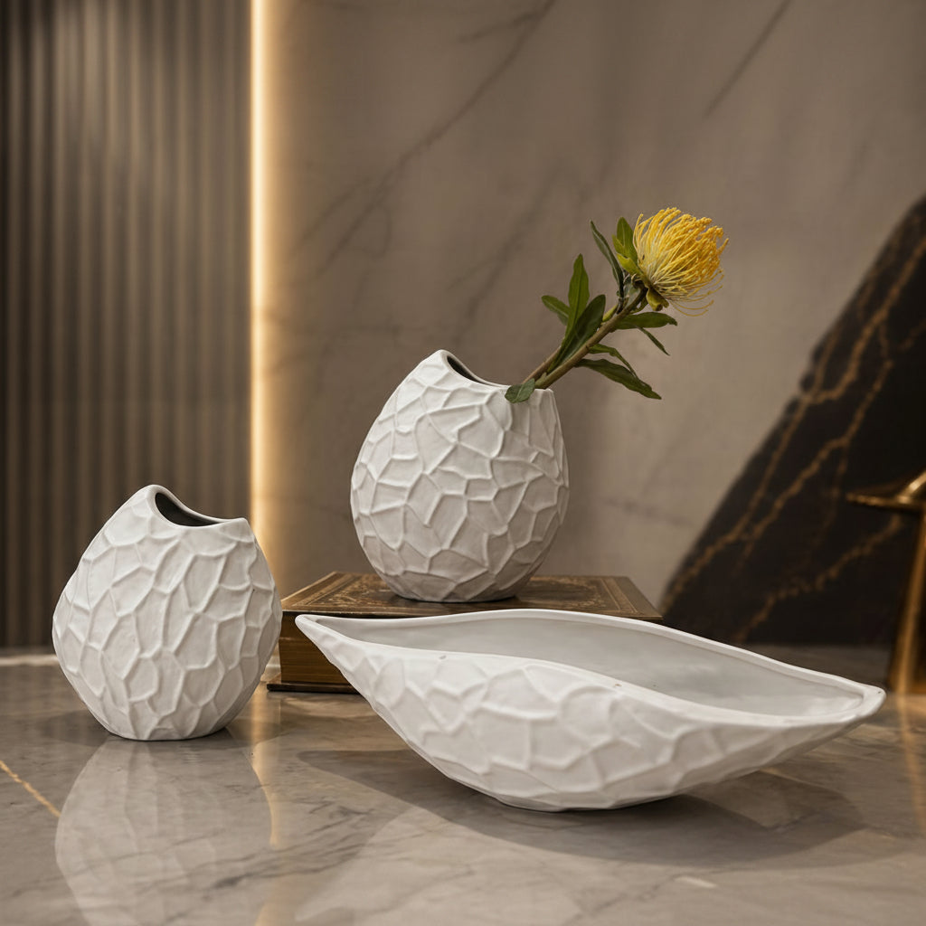 3 piece white abstract sculptural décor set featuring unique modern decorative pieces in small, medium, and large sizes.