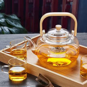 Luxury glass tea set with 1400ml teapot, 6 glass cups, and bamboo serving tray. 🍵✨