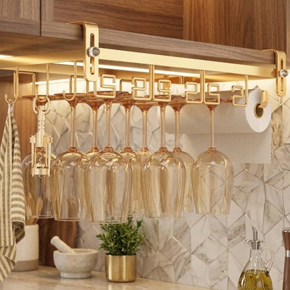 Golden under cabinet wine glass holder with towel and tissue rack, metallic kitchen storage organizer. 🍷✨