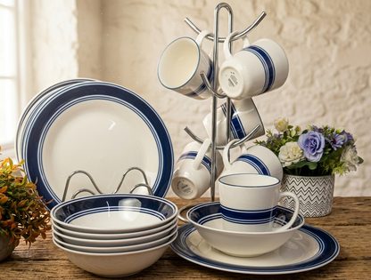 18-Piece ceramic dinner set with blue rim design including plates, bowls, and cups