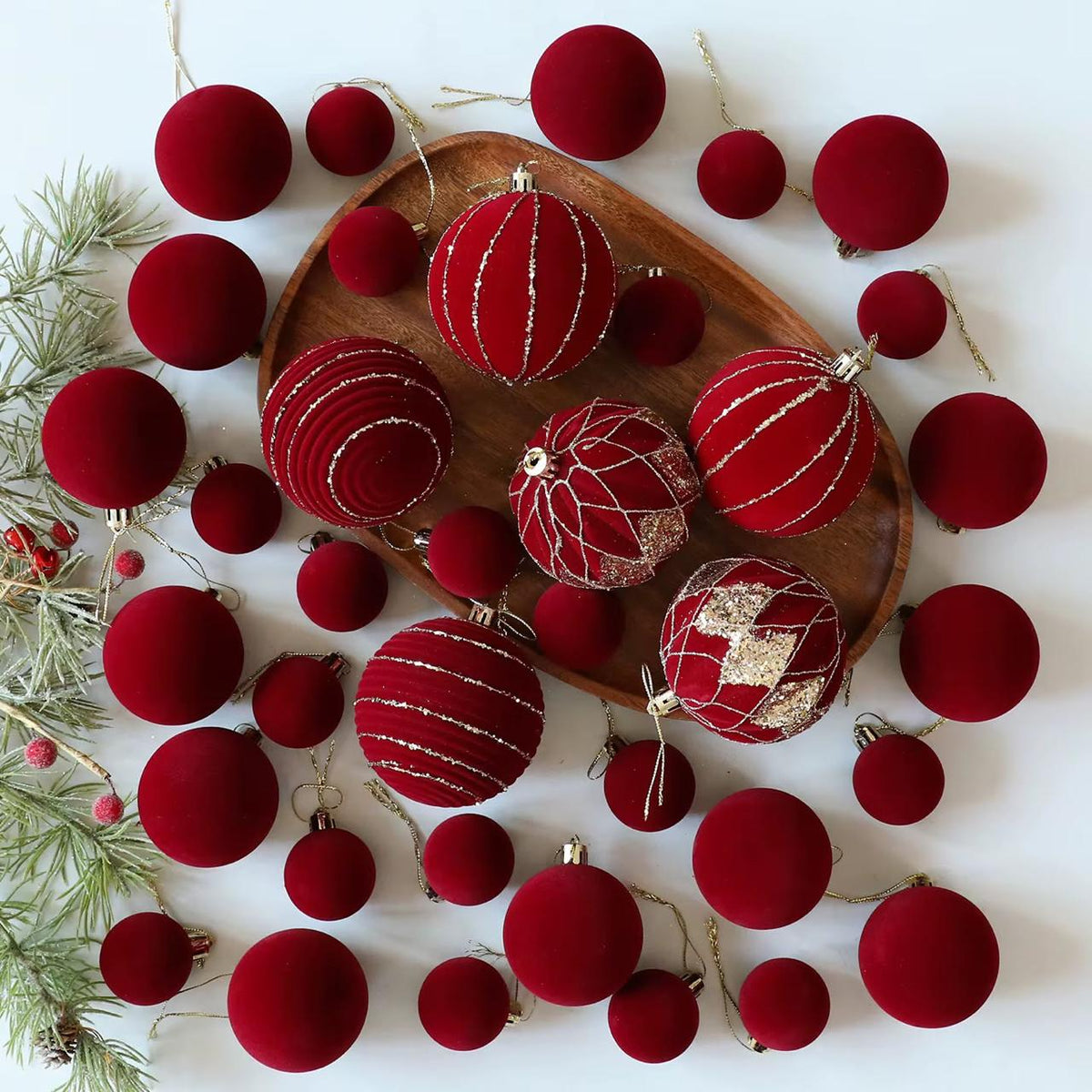 36-Piece Burgundy Velvet Christmas Bauble Set with Assorted Sizes, Decorative Designs and Gold Glitter Details available in Nairobi, Kenya