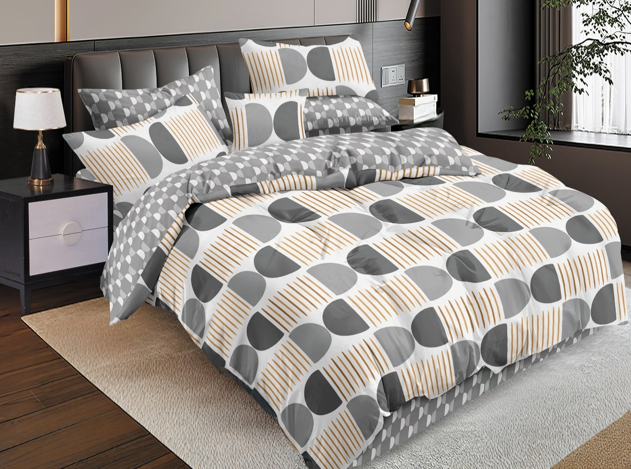 Pure cotton duvet cover set with bedsheet and pillowcases neatly arranged on a bed.