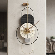 Modern geometric wall clock measuring 45 × 90 cm with bold lines and gold accents for contemporary home and office décor.