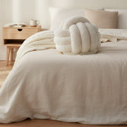 Knot ball decorative pillow 30 cm in white and brown for home décor