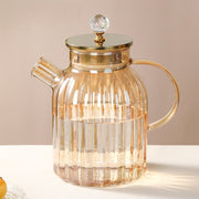 Amber pumpkin striped borosilicate glass teapot with 1800 ml capacity suitable for direct flame use