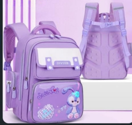 Orthopedic children’s school bag with spine support in blue, green, and purple