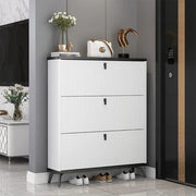 White wooden shoe rack cabinet with black accents and flip-down compartments for organised shoe storage in entryways, hallways, and bedrooms
