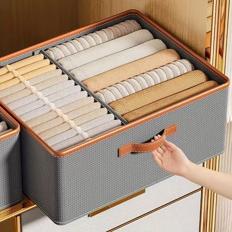 Grey foldable double compartment closet organizer for storing jeans, T-shirts, underwear, and socks