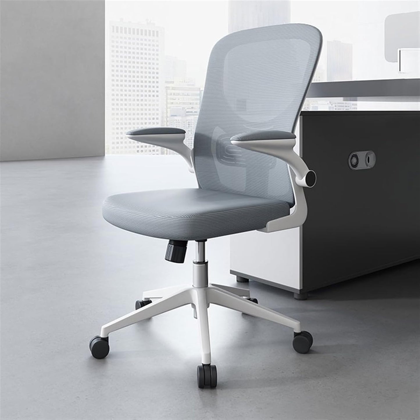 Orthopedic medium back office chair with ergonomic design and adjustable features.