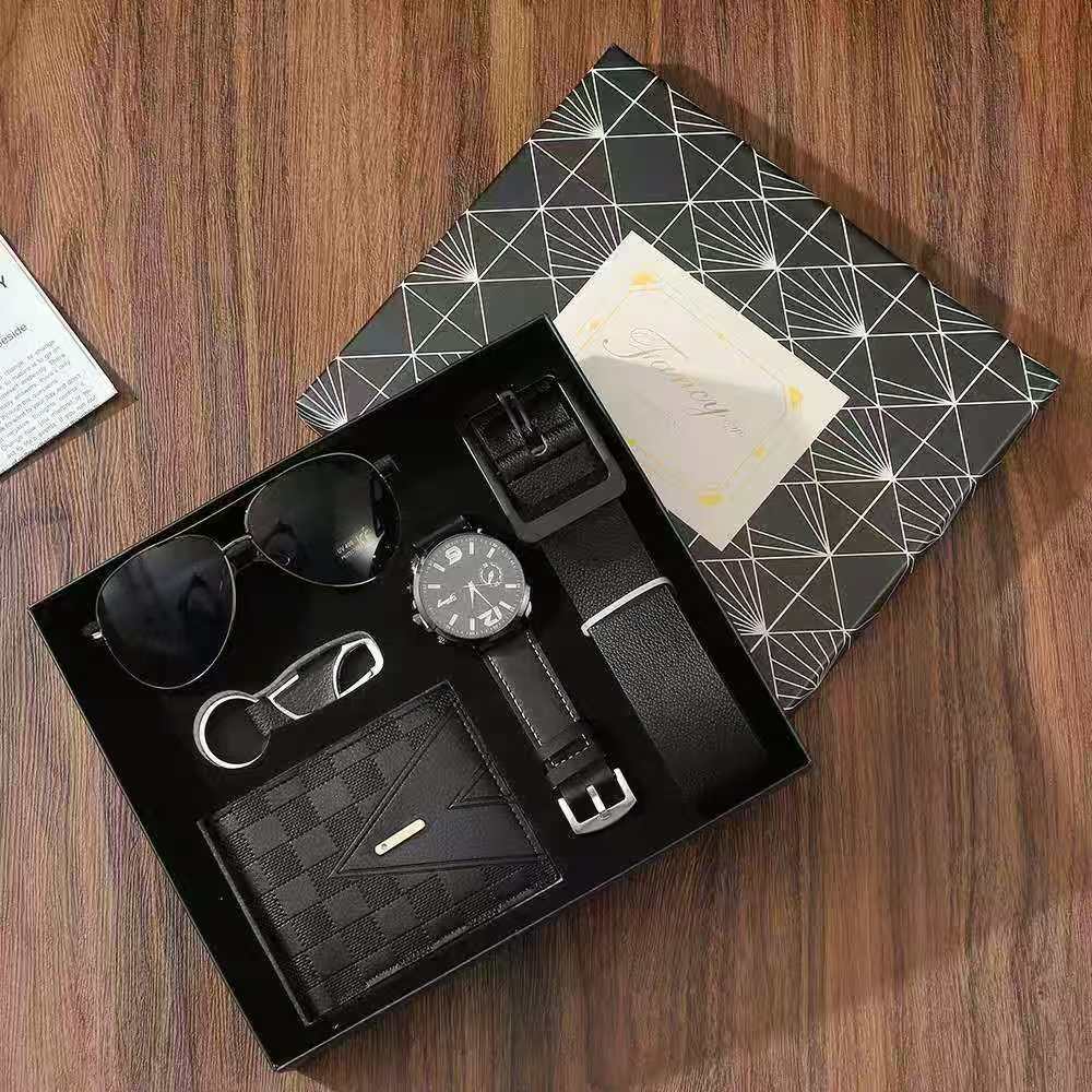 Elegant men’s gift set with wristwatch, sunglasses, leather wallet, adjustable belt, and matching accessories in a classy gift box