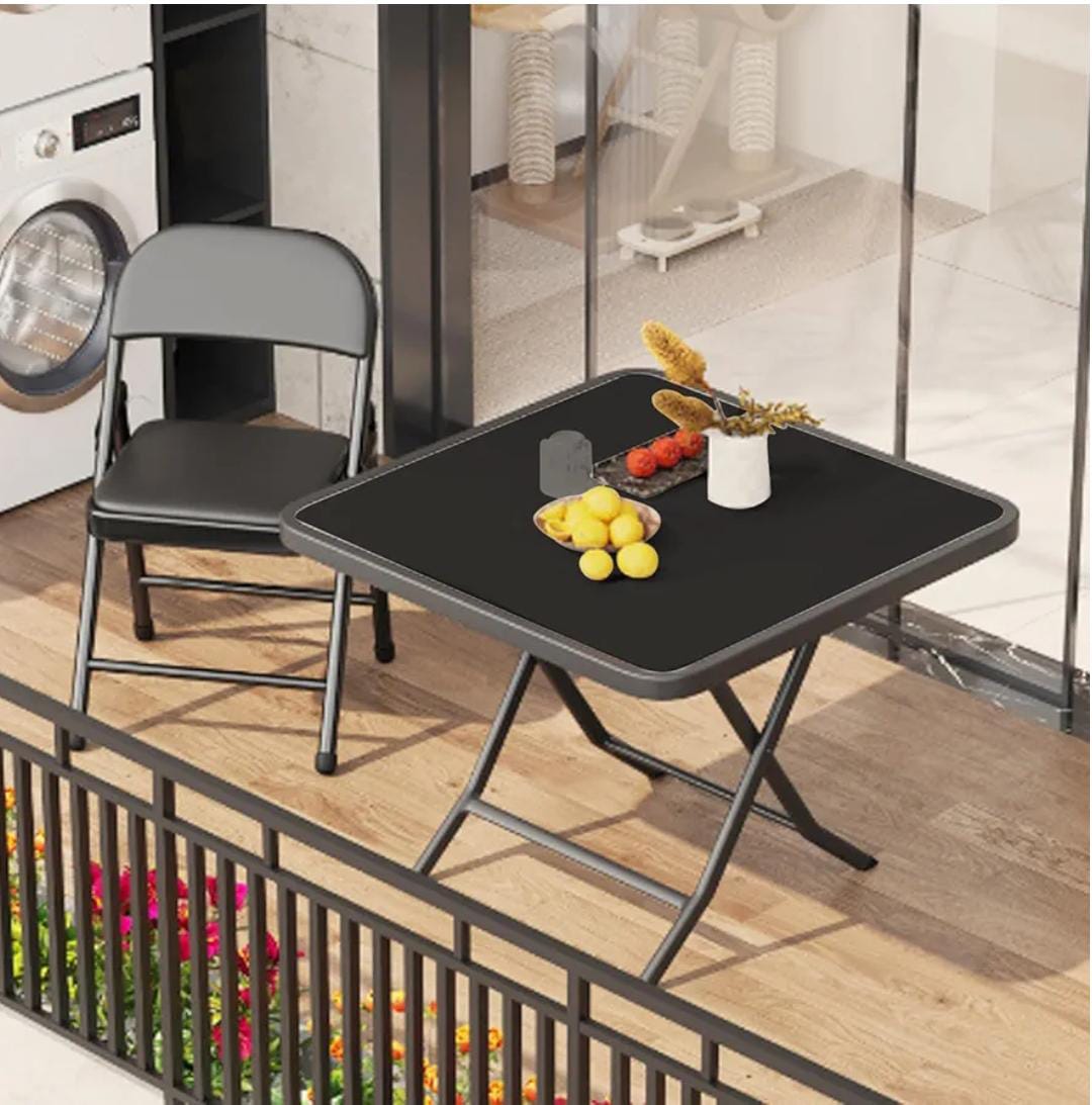 Portable foldable table with quick-folding design for indoor and outdoor use, easy storage, and transportation.