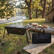 Portable foldable stainless steel barbecue grill 50x30cm with carry bag, outdoor charcoal BBQ in black.