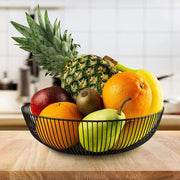 Black oval shaped metallic fruit basket.