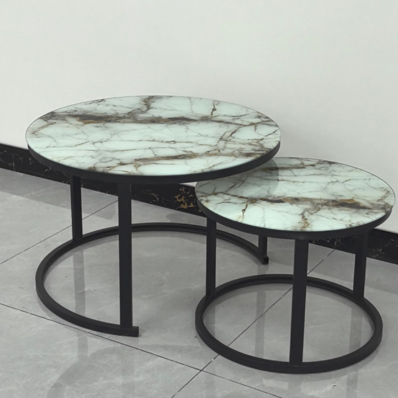 Modern nesting coffee table set with elegant glass effect finish for stylish and space saving living room décor.