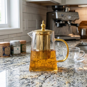 Heat resistant glass teapot with stainless steel infuser and square filter basket for brewing tea