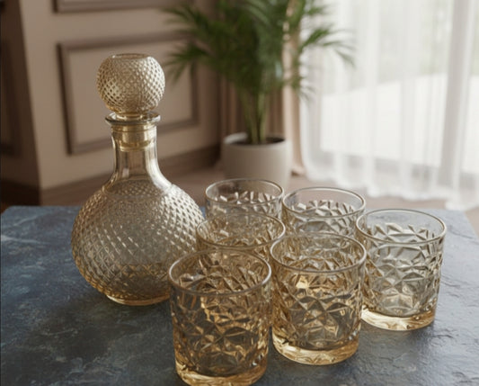 Gold crystal 7-piece glass decanter set.
