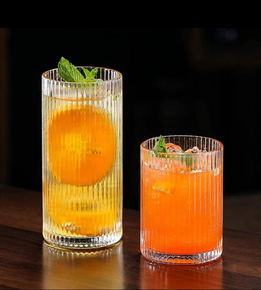 Set of six clear Japanese style ribbed drinking glasses with 400 ml capacity.