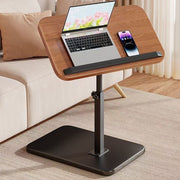 Adjustable C-shaped side table for laptops and everyday use beside sofas, beds, and chairs.
