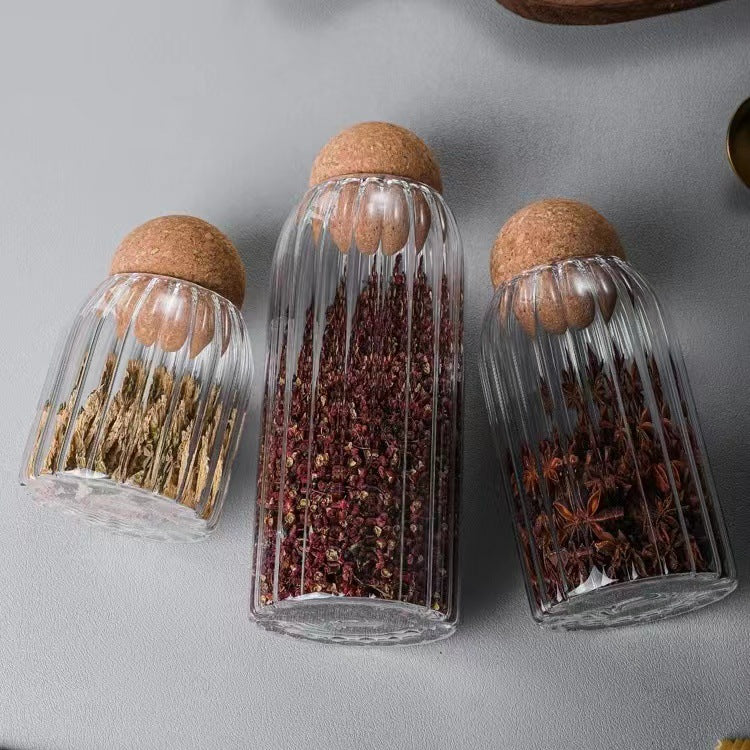 Three piece glass spice jar set with bamboo lids in 1000 ml, 800 ml, and 500 ml capacities for kitchen storage.