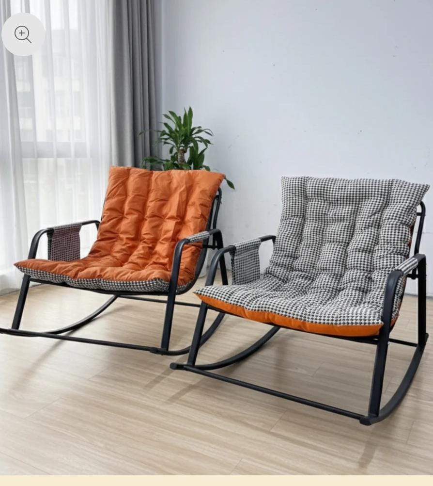 Modern rocking chair with orange tufted cushion, comfortable indoor and outdoor seating for relaxation.