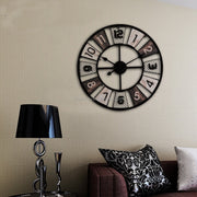 Modern light luxury metal round wall clock with hollow design, quartz movement, and Arabic numerals