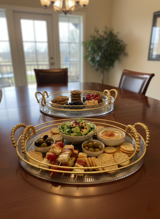 Three piece clear acrylic tray set with gold handles for serving and décor.