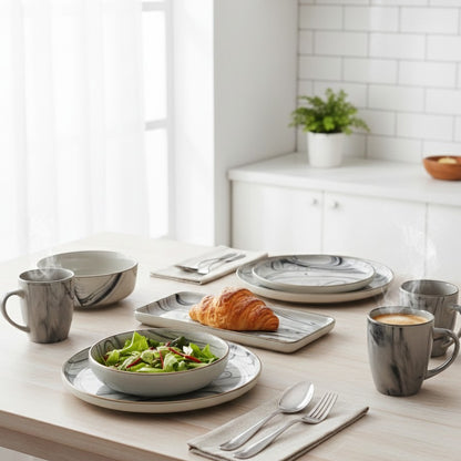 26-piece Marble dinner set including cups, plates, bowls, and platters.