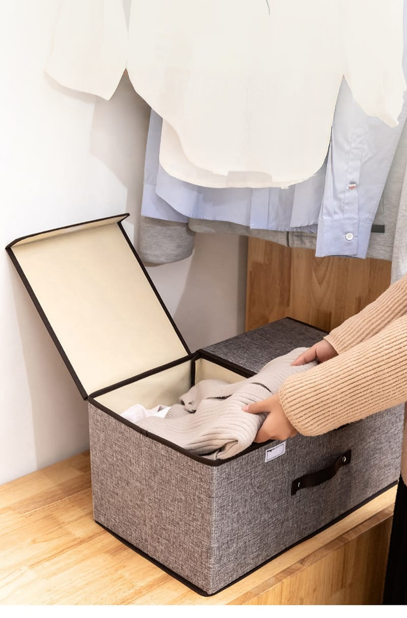 Grey foldable cotton linen storage box with double cover and partitioned compartments.