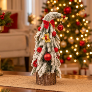 Decorated Snow Flocked Mini Christmas Tree with Red and Gold Ornaments and Rustic Wooden Base for Tabletop Displays available in Nairobi, Kenya