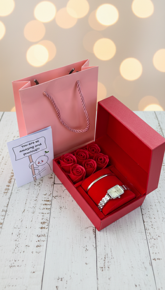 Valentines ladies gift set with DW watch, DW bracelet, rose petals box, card, and gift bag.