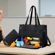 Quilted laptop tote bag with insulated lunch compartment and spacious interior.