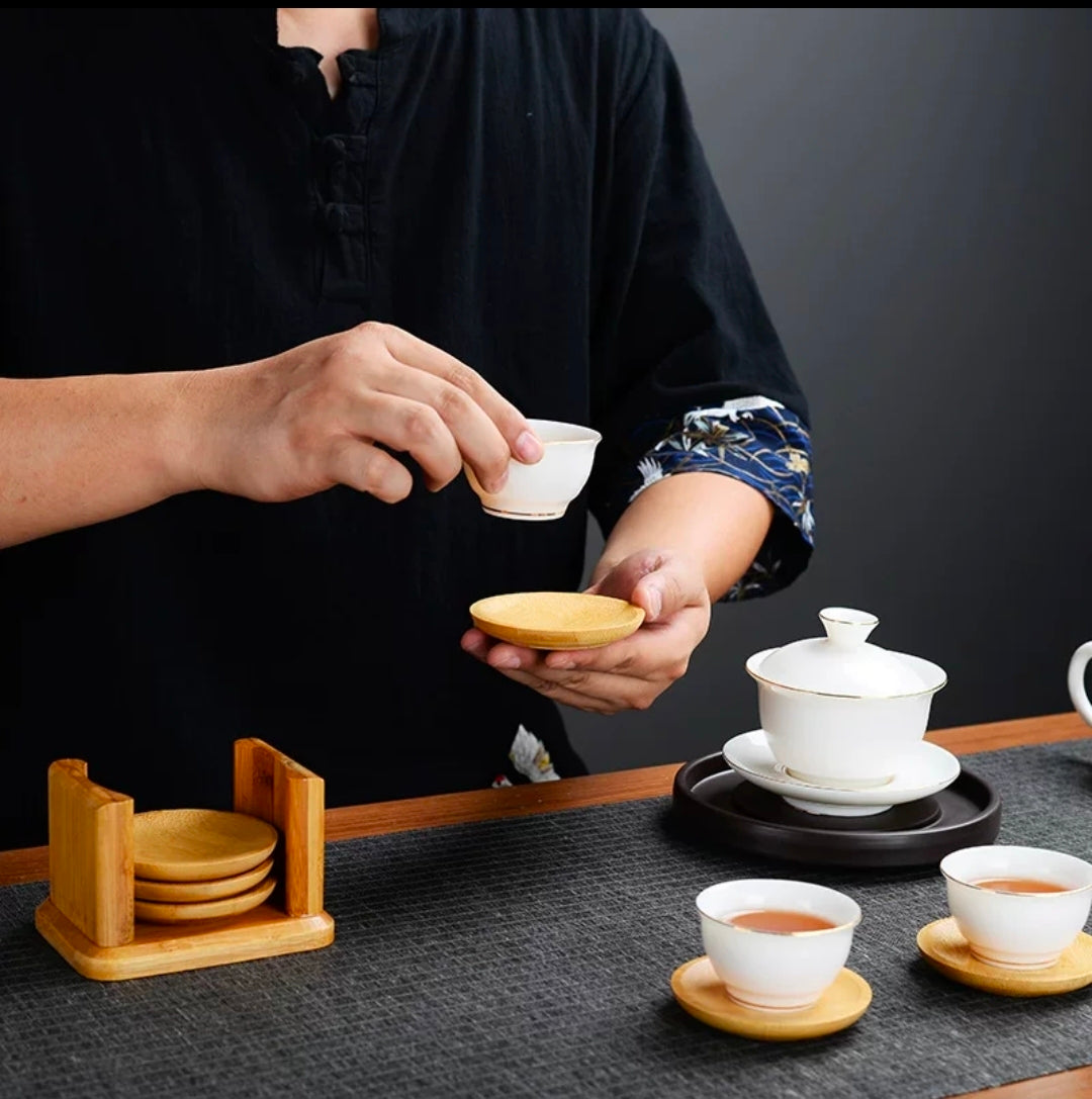 Elegant bamboo coaster set with holder stand for protecting tables from stains and heat