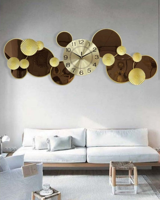 Designer metallic wall clock with modern finish, elegant decorative timepiece for home or office interiors. 