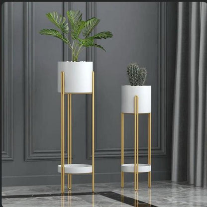  Text
White decorative planter stand for indoor and outdoor plants.