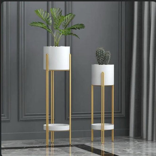  Text
White decorative planter stand for indoor and outdoor plants.