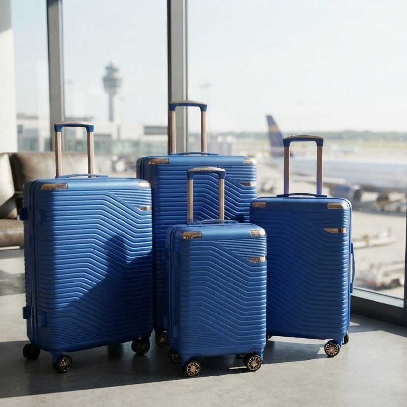 4 piece Jazz Power hard shell suitcase set with smooth rolling wheels, telescopic handles, and a largest suitcase size of 30 inches.