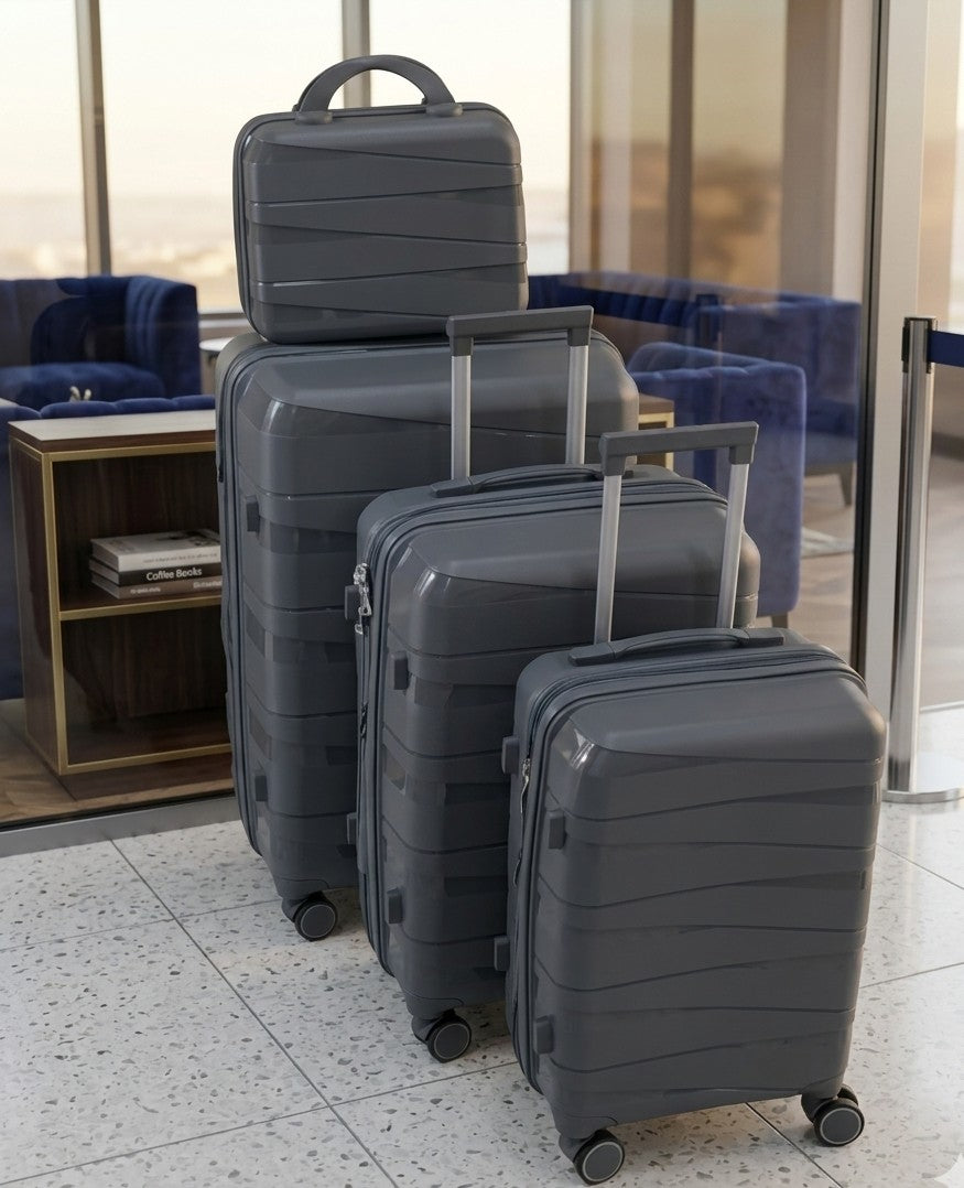 4-piece luxurious unbreakable suitcase luggage set with zipper closure, telescopic handle, and 360-degree spinner wheels in multiple sizes.