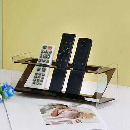 Acrylic remote holder with bold black accents, 10x24x10cm